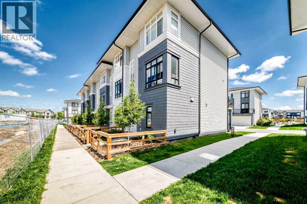 311, 857 Belmont Drive SW, Calgary, Alberta  T2X 4P2 - Photo 1 - A2317370