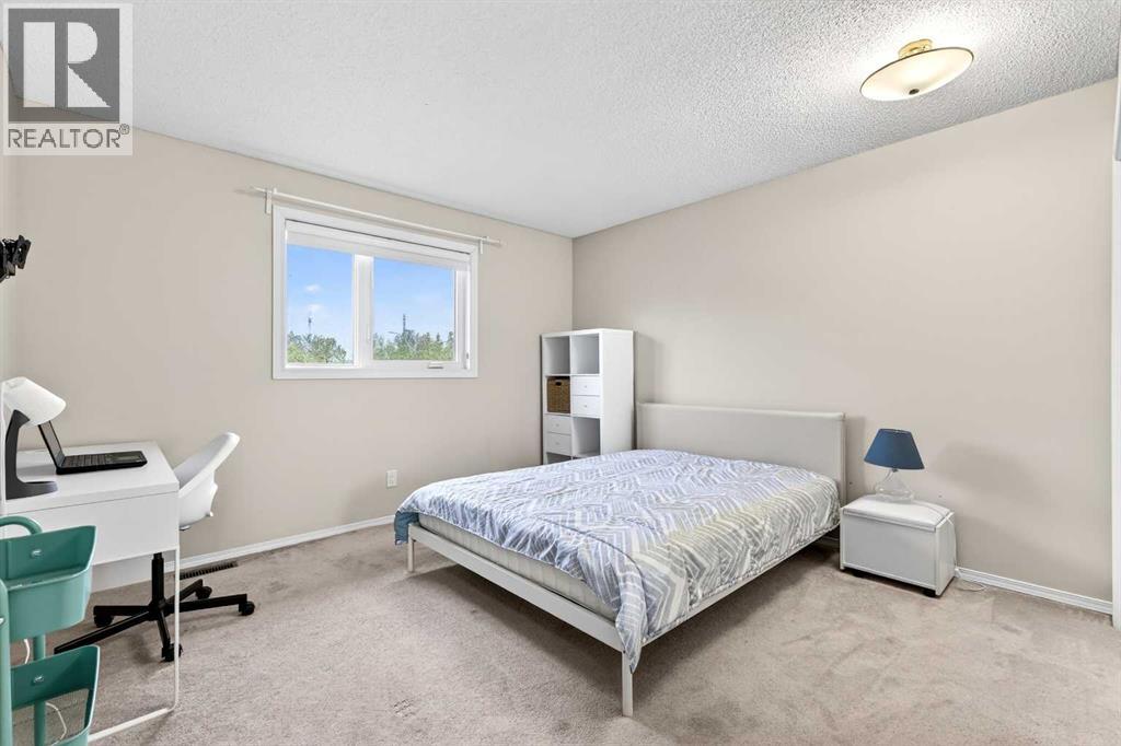 115 Woodpark Terrace SW, Calgary, Alberta  T2W 6E7 - Photo 37 - A2318422
