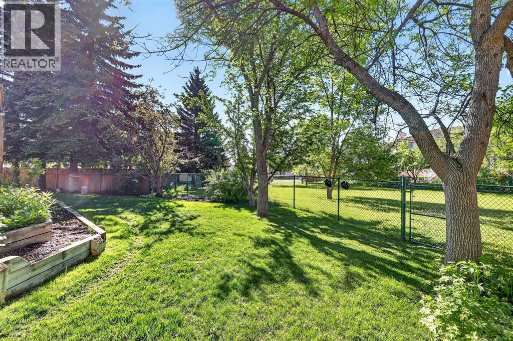 115 Woodpark Terrace SW, Calgary, Alberta  T2W 6E7 - Photo 2 - A2318422