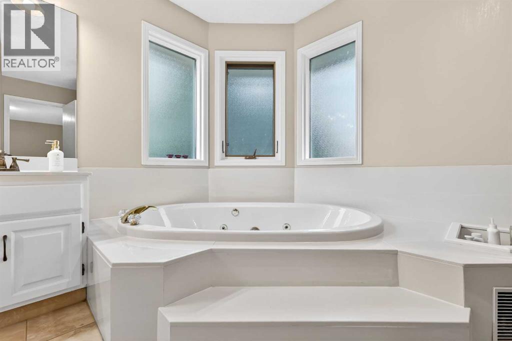 115 Woodpark Terrace SW, Calgary, Alberta  T2W 6E7 - Photo 33 - A2318422