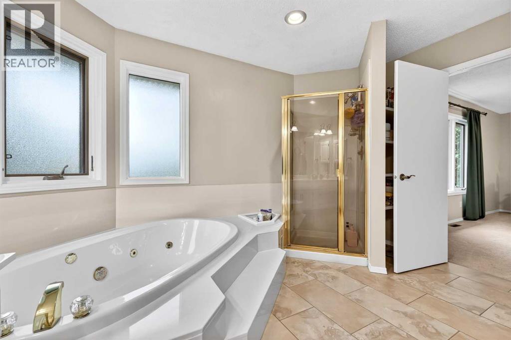 115 Woodpark Terrace SW, Calgary, Alberta  T2W 6E7 - Photo 32 - A2318422
