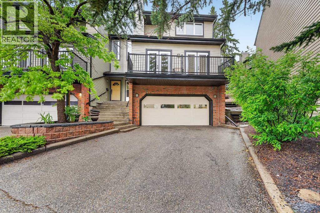 4, 448 Strathcona Drive SW, Calgary, Alberta  T3H 1M3 - Photo 1 - A2317615