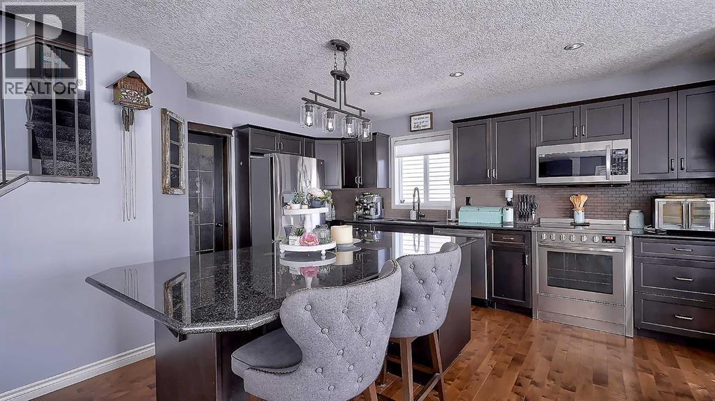 116 Kingsland Court SE, Airdrie, Alberta  T4A 0E5 - Photo 15 - A2317259