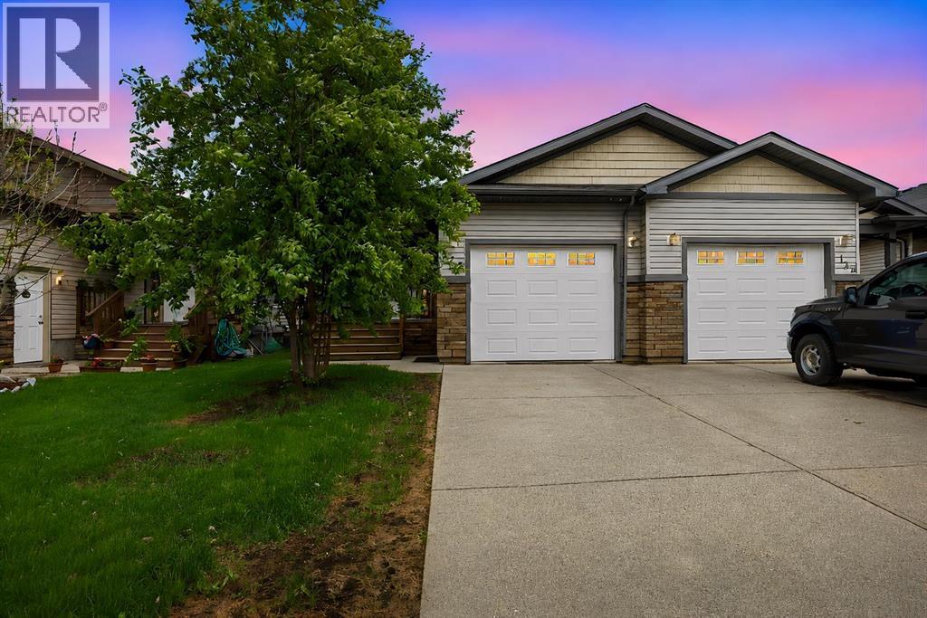 128 Hawthorn Way, Fort Mcmurray, Alberta  T9K 0N6 - Photo 1 - A2318098
