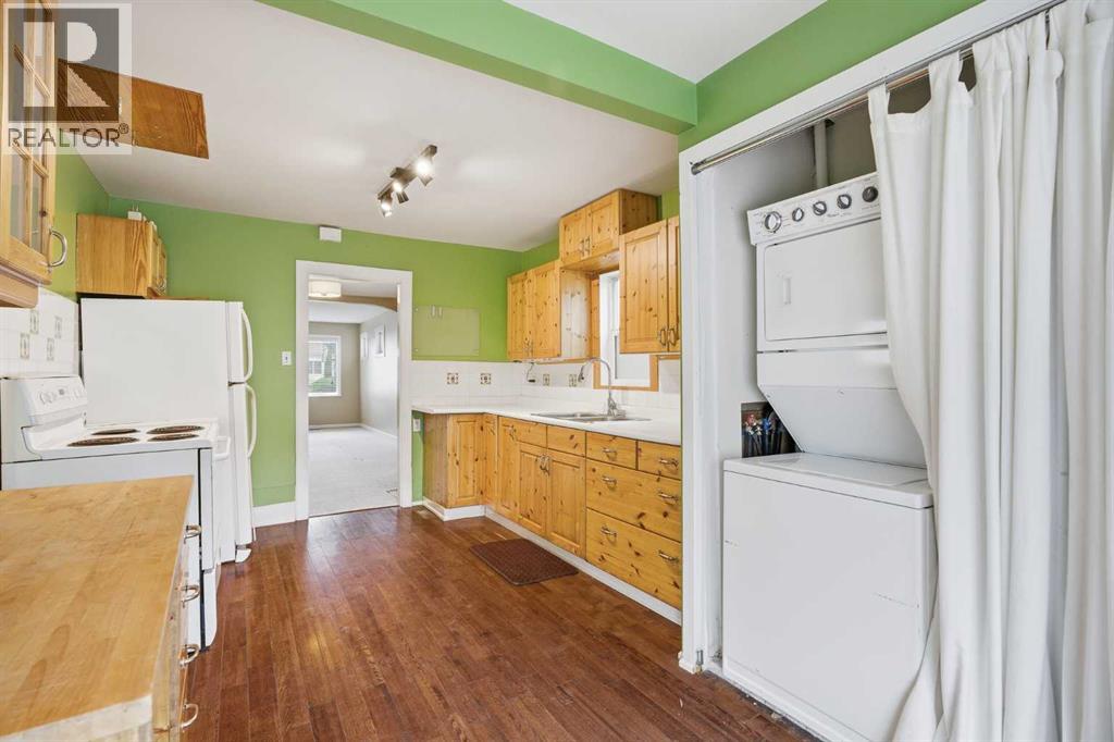 919 20 Avenue NW, Calgary, Alberta  T2M 1E6 - Photo 18 - A2318248
