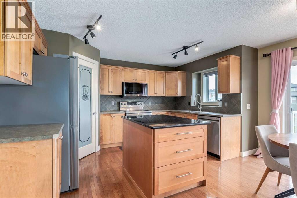 664 Luxstone Landing Sw, Airdrie, Alberta  T4B 3L2 - Photo 9 - A2315122