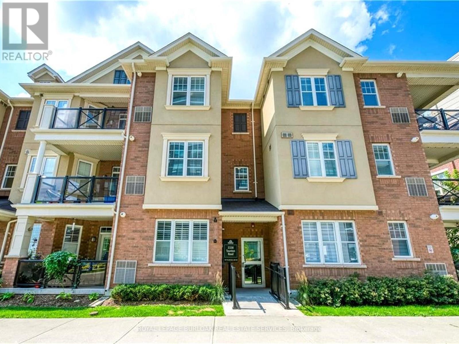 310 - 2338 Taunton Road, Oakville, Ontario  L6H 0L3 - Photo 1 - W13411906