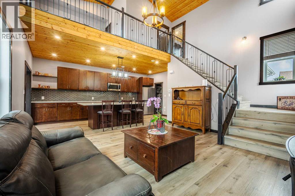 216 Cottageclub Crescent, Rural Rocky View County, Alberta  T4C 1B1 - Photo 6 - A2302814