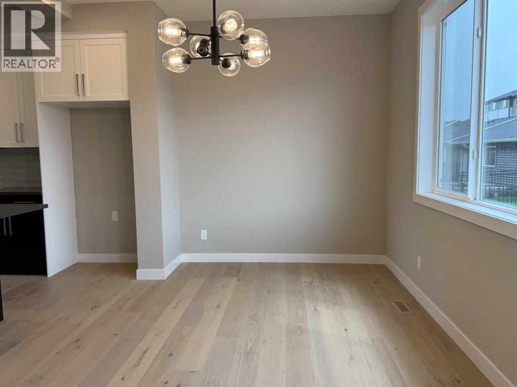 302 Sundown Road, Cochrane, Alberta  T4C 3H2 - Photo 19 - A2256036