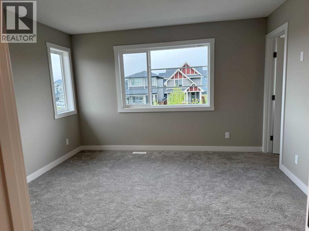 302 Sundown Road, Cochrane, Alberta  T4C 3H2 - Photo 25 - A2256036