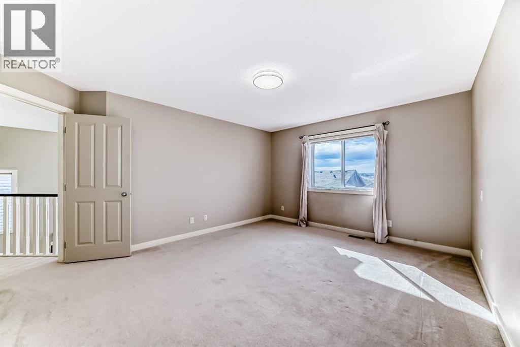 455 Hidden Creek Boulevard NW, Calgary, Alberta  T3K 0C1 - Photo 19 - A2311254
