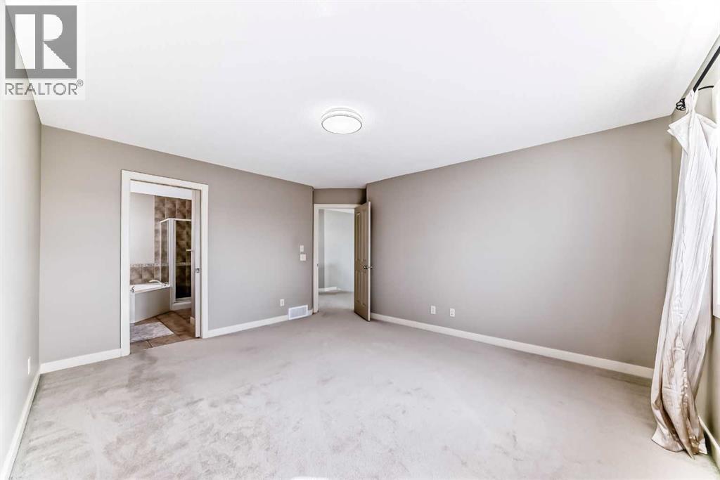 455 Hidden Creek Boulevard NW, Calgary, Alberta  T3K 0C1 - Photo 20 - A2311254