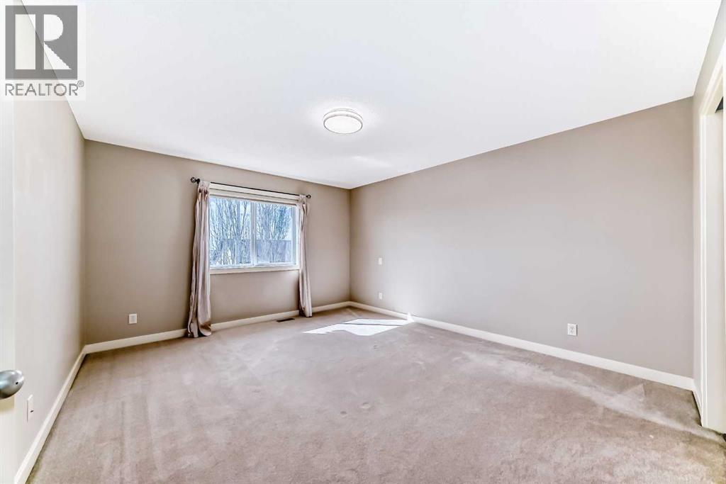 455 Hidden Creek Boulevard NW, Calgary, Alberta  T3K 0C1 - Photo 18 - A2311254