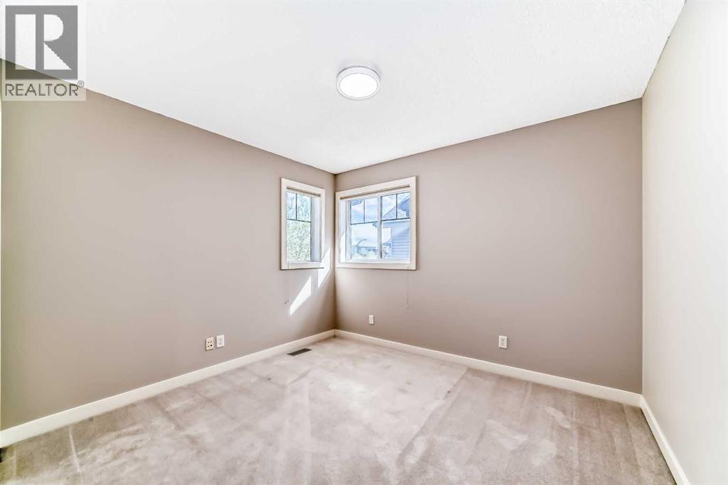 455 Hidden Creek Boulevard NW, Calgary, Alberta  T3K 0C1 - Photo 25 - A2311254