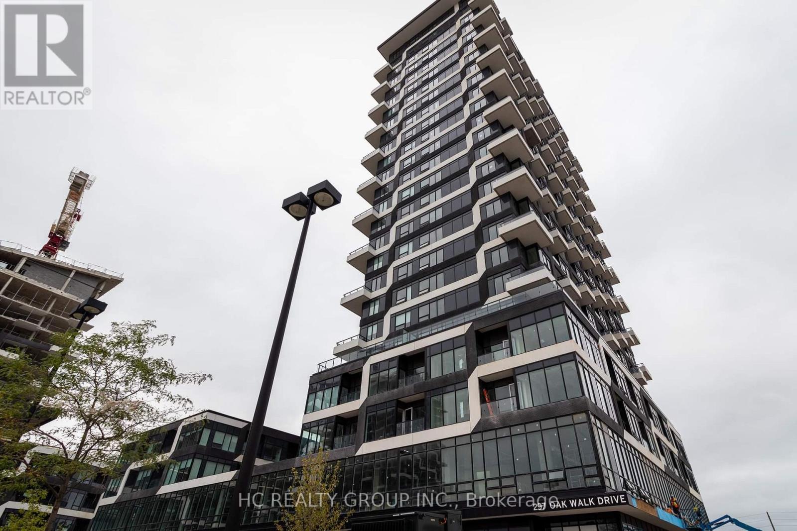 702 - 297 Oak Walk Drive, Oakville (Ro River Oaks), Ontario  L6H 6Z3 - Photo 3 - W13412536