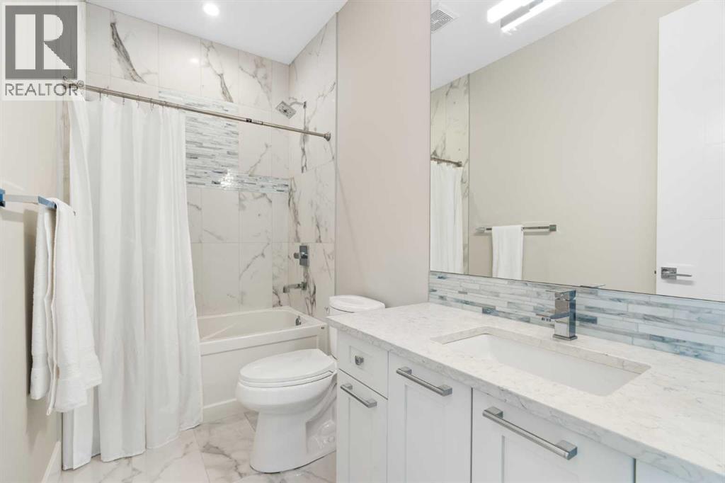 709 23 Avenue NW, Calgary, Alberta  T2M 1T1 - Photo 29 - A2317906