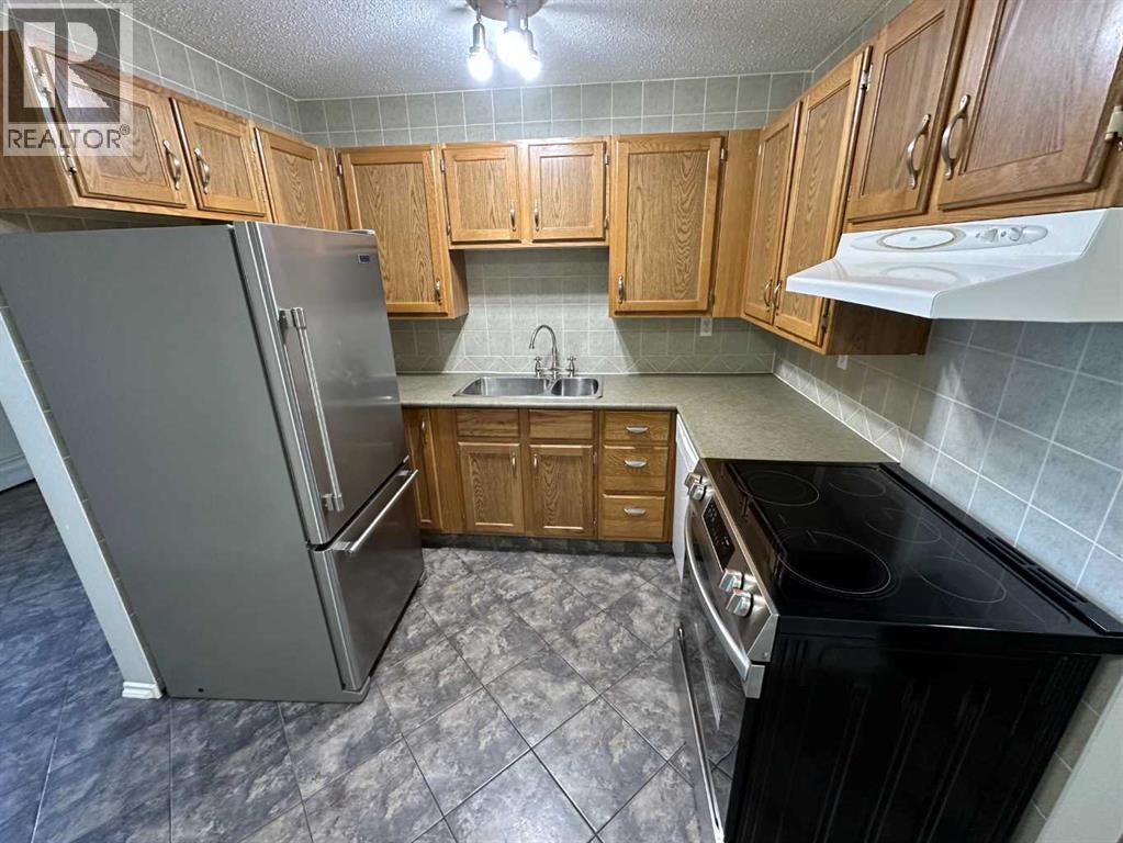 102, 7031 Gray Drive, Red Deer, Alberta  T4P 2B1 - Photo 2 - A2311256
