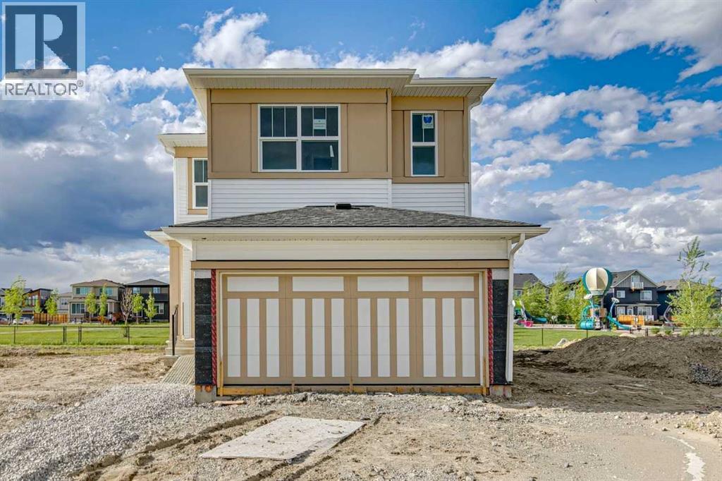 98 Creekstone Place Sw, Calgary, Alberta  T2X 5M9 - Photo 2 - A2296722
