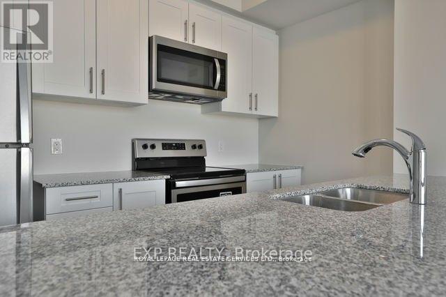 414 - 150 Oak Park Boulevard, Oakville, Ontario  L6H 0E7 - Photo 8 - W13415276