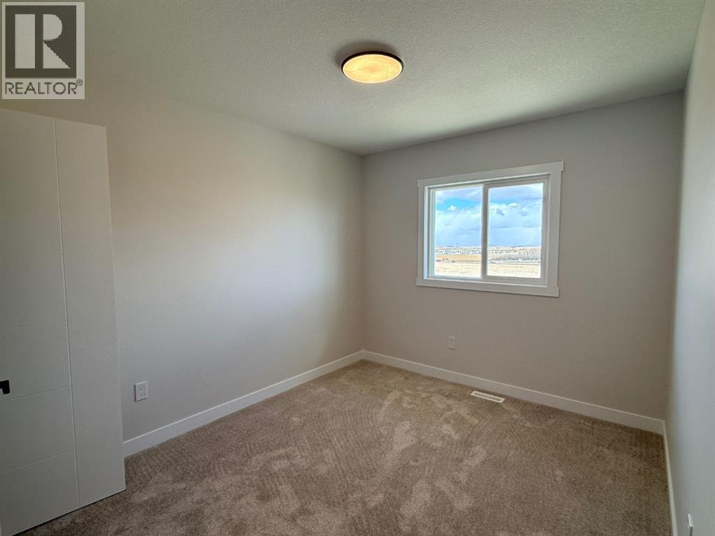 1927 Mccaskill Drive, Crossfield, Alberta  T0M 0S0 - Photo 15 - A2305127
