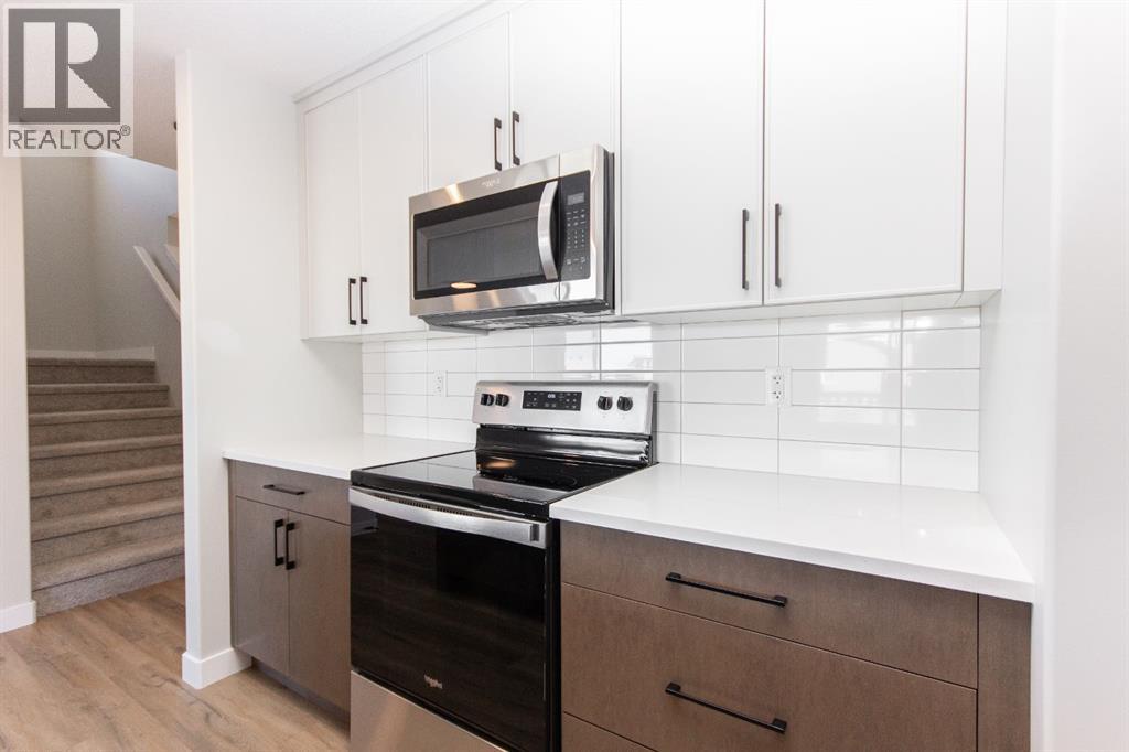 655 Robinson Avenue, Penhold, Alberta  T0M 1R0 - Photo 10 - A2312933