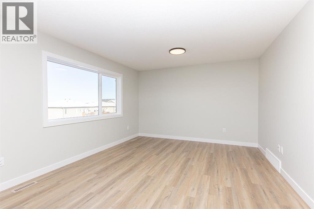 655 Robinson Avenue, Penhold, Alberta  T0M 1R0 - Photo 15 - A2312933