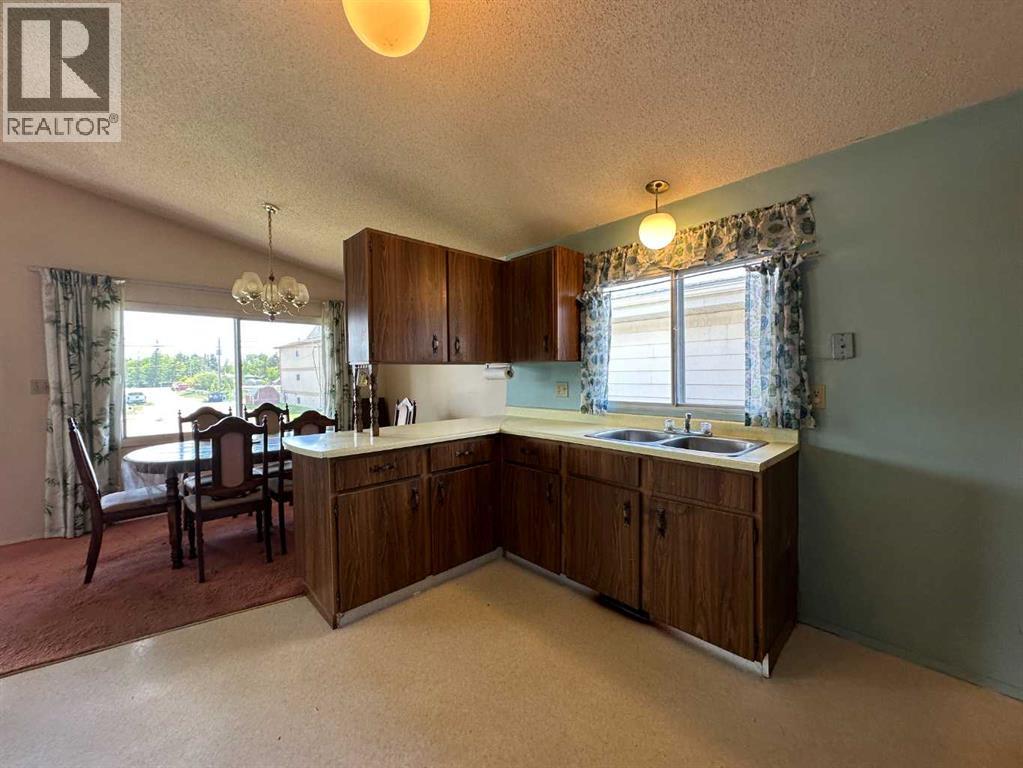 5406 54 Street, Ponoka, Alberta  T4L 1L9 - Photo 4 - A2319089
