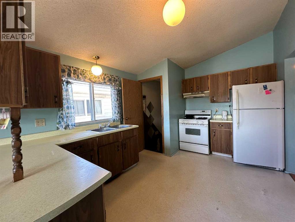 5406 54 Street, Ponoka, Alberta  T4L 1L9 - Photo 2 - A2319089