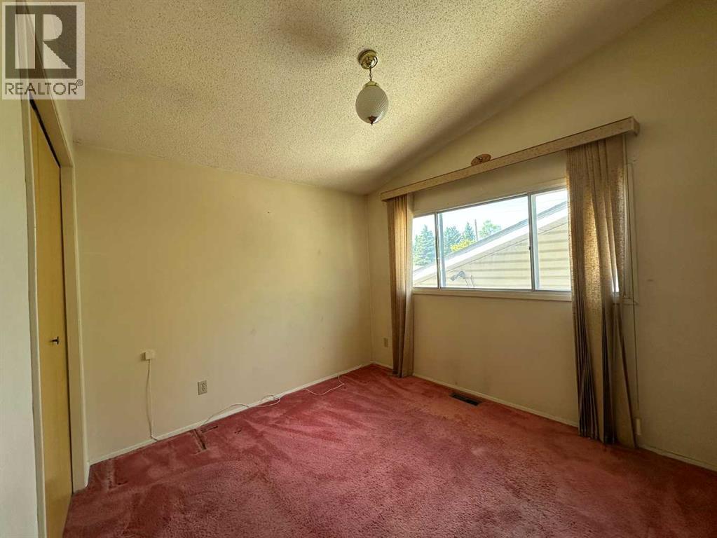 5406 54 Street, Ponoka, Alberta  T4L 1L9 - Photo 7 - A2319089