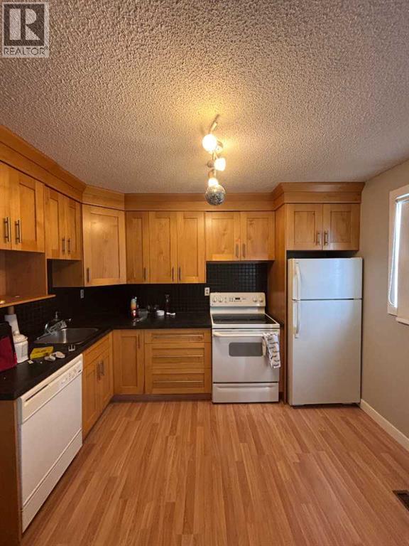 62 Carleton Road W, Lethbridge, Alberta  t1k 3X5 - Photo 3 - A2319139