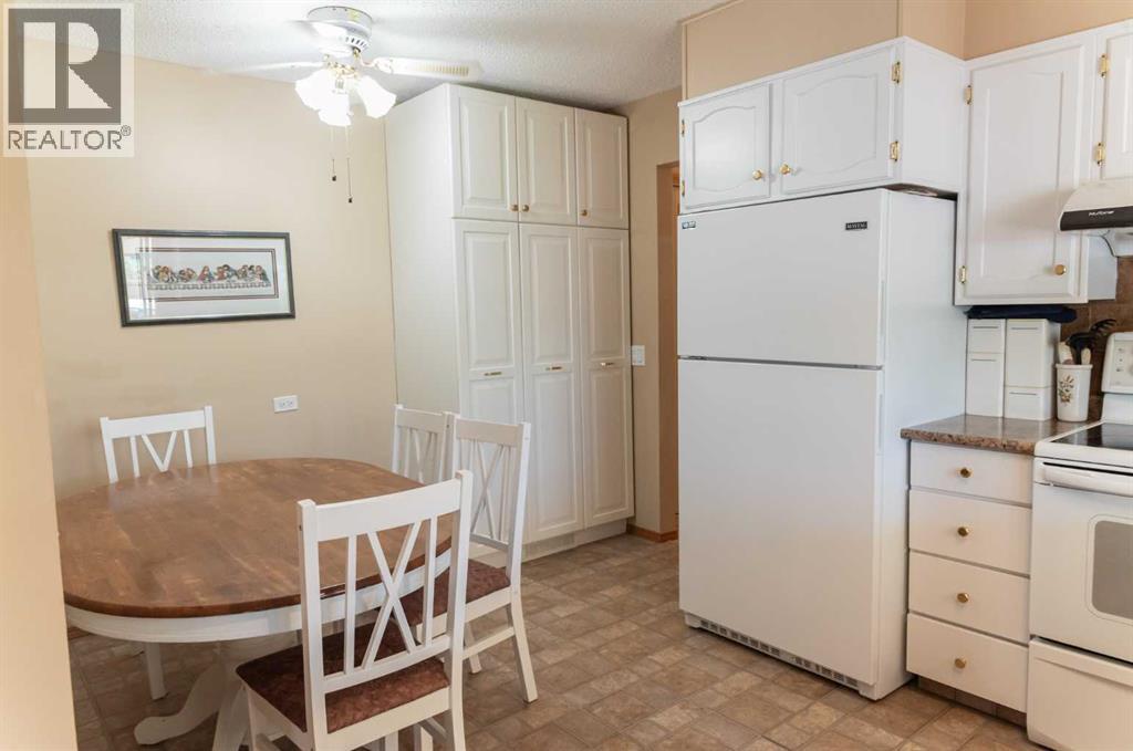 164 Huntford Road Ne, Calgary, Alberta  T2K 3Y9 - Photo 11 - A2317475