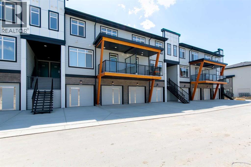 207, 414 Seton Passage Se, Calgary, Alberta  T3M 3A7 - Photo 3 - A2318663