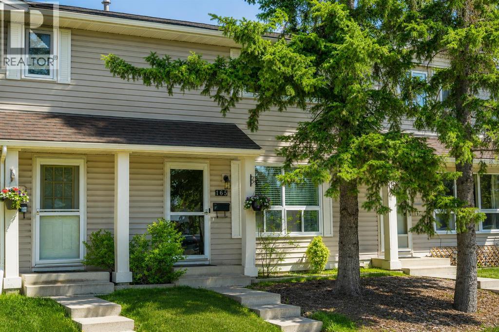 165 Woodmont Terrace SW, Calgary, Alberta  T2W 4Z4 - Photo 2 - A2314987