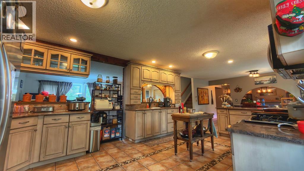 94 Redwood Meadows Drive, Rural Rocky View County, Alberta  T3Z 1A3 - Photo 11 - A2317321