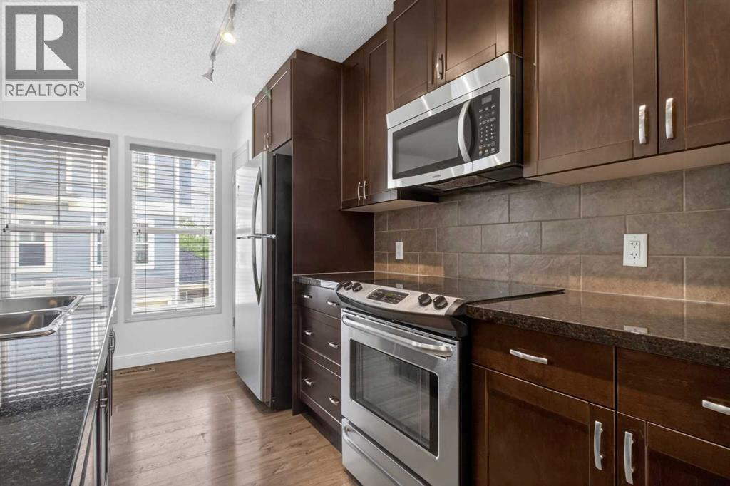 128 Auburn Bay Common SE, Calgary, Alberta  T3M 0M5 - Photo 16 - A2316334