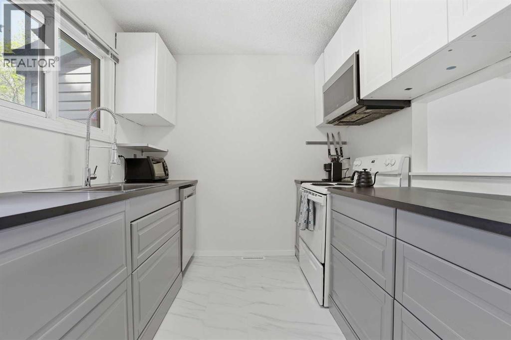 13, 131 Templehill Drive NE, Calgary, Alberta  T1Y 4T1 - Photo 6 - A2316541