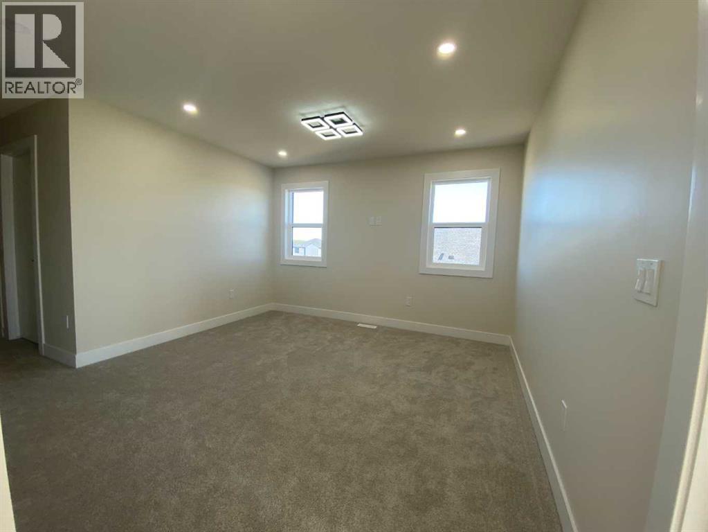 709 Mandalay Avenue NW, Carstairs, Alberta  T0M 0N0 - Photo 26 - A2319109