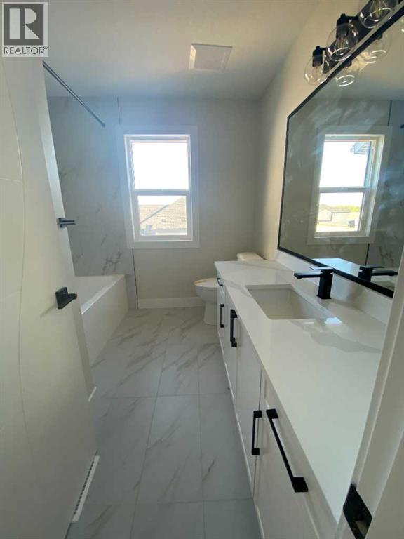 709 Mandalay Avenue NW, Carstairs, Alberta  T0M 0N0 - Photo 31 - A2319109