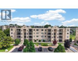 310 VILLAGE GROVE DRIVE Unit# 413, Tecumseh, Ontario
