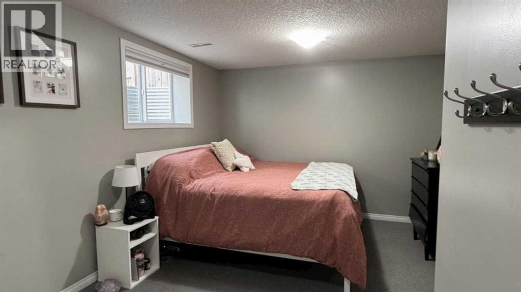 379 Cimarron Boulevard, Okotoks, Alberta T1S 2L8 - Photo 18 - A2312540
