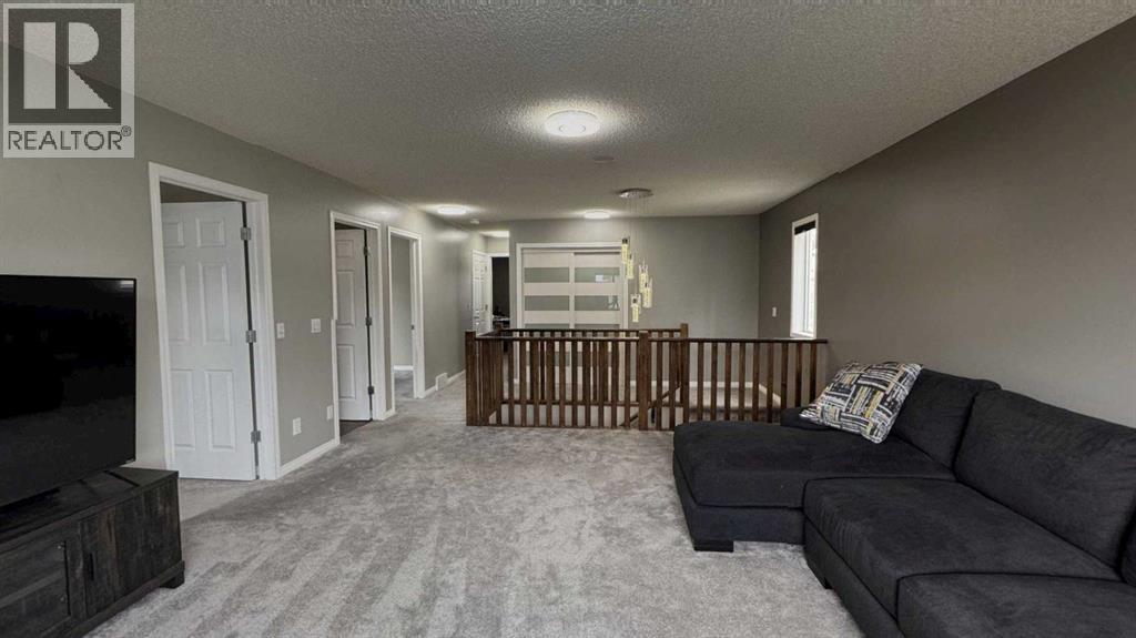379 Cimarron Boulevard, Okotoks, Alberta T1S 2L8 - Photo 14 - A2312540