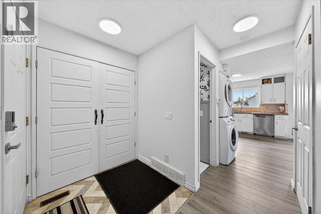 6979 Laguna Way Ne, Calgary, Alberta  T1Y 6W5 - Photo 8 - A2316513