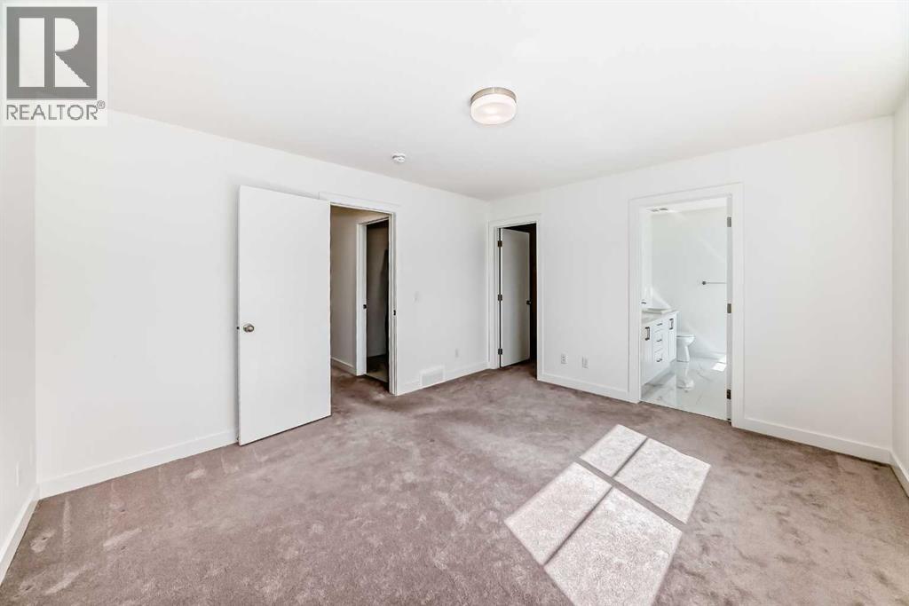53 Spring Creek Common Sw, Calgary, Alberta  T3H 6E2 - Photo 21 - A2318931