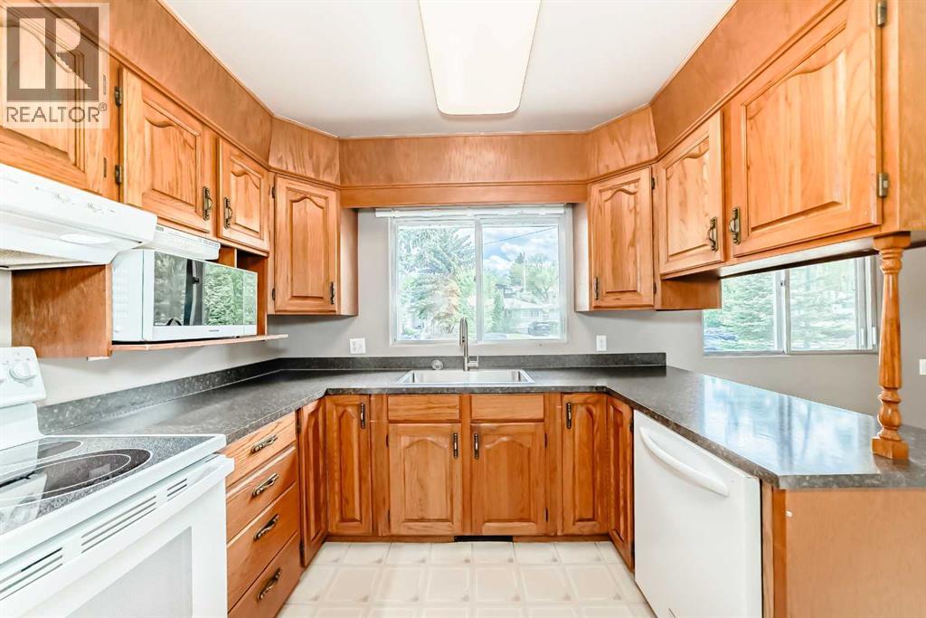 1228 Rosehill Drive NW, Calgary, Alberta  T2K 1M1 - Photo 6 - A2318980