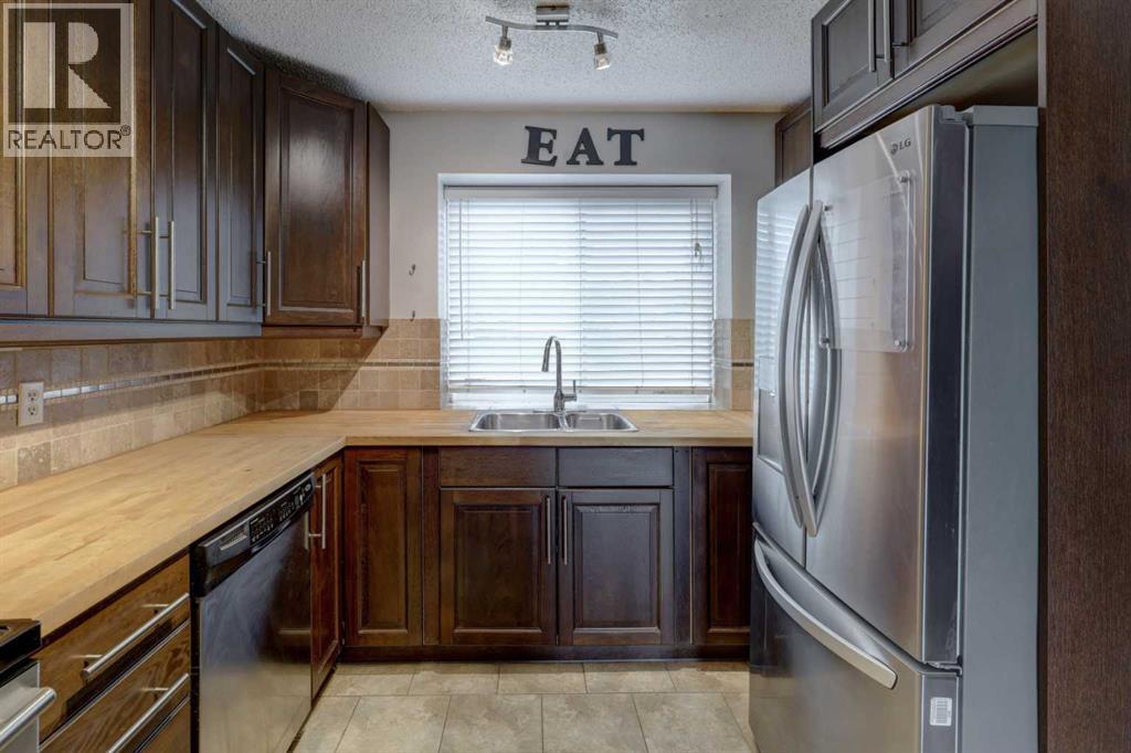40 Georgian Villas Ne, Calgary, Alberta T2A 7C4 - Photo 6 - A2317417