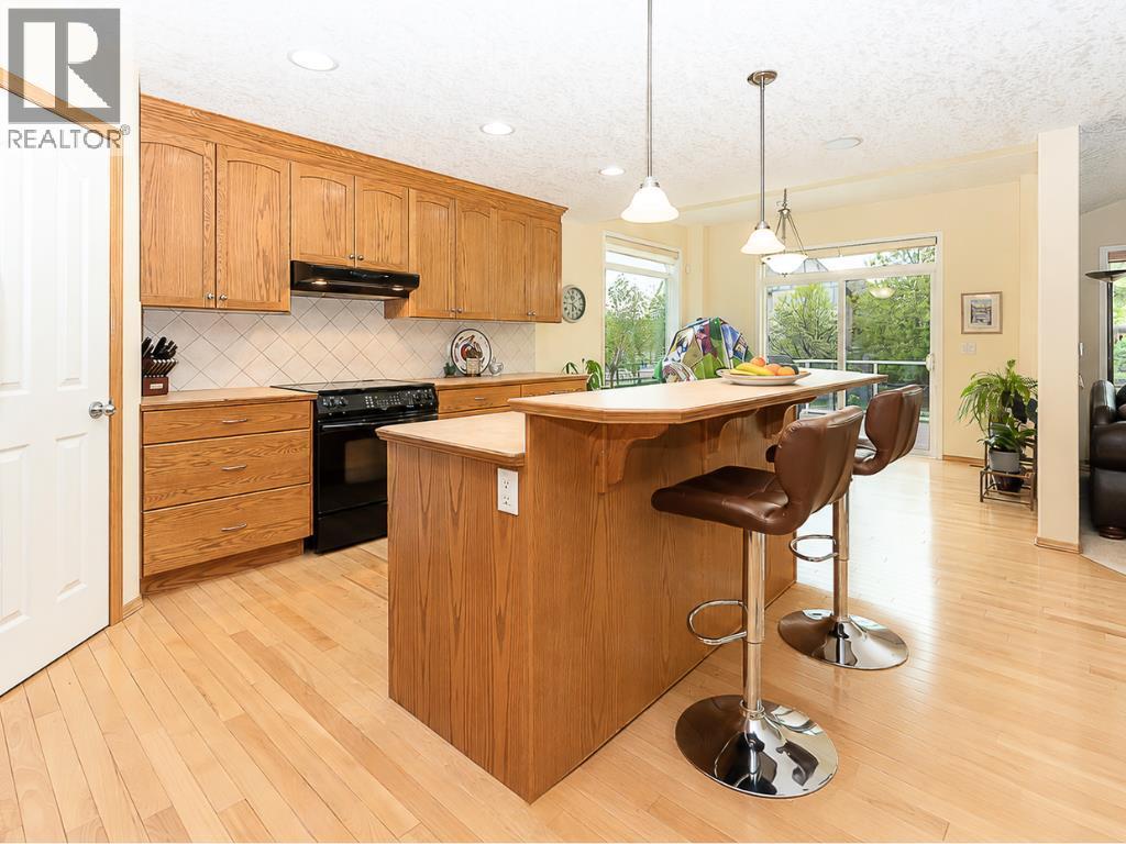 143 Cougarstone Square SW, Calgary, Alberta  T3H 5J4 - Photo 6 - A2318077
