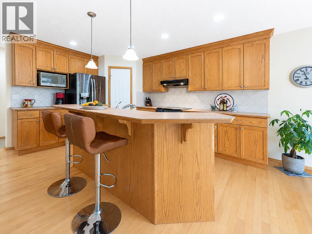143 Cougarstone Square SW, Calgary, Alberta  T3H 5J4 - Photo 5 - A2318077