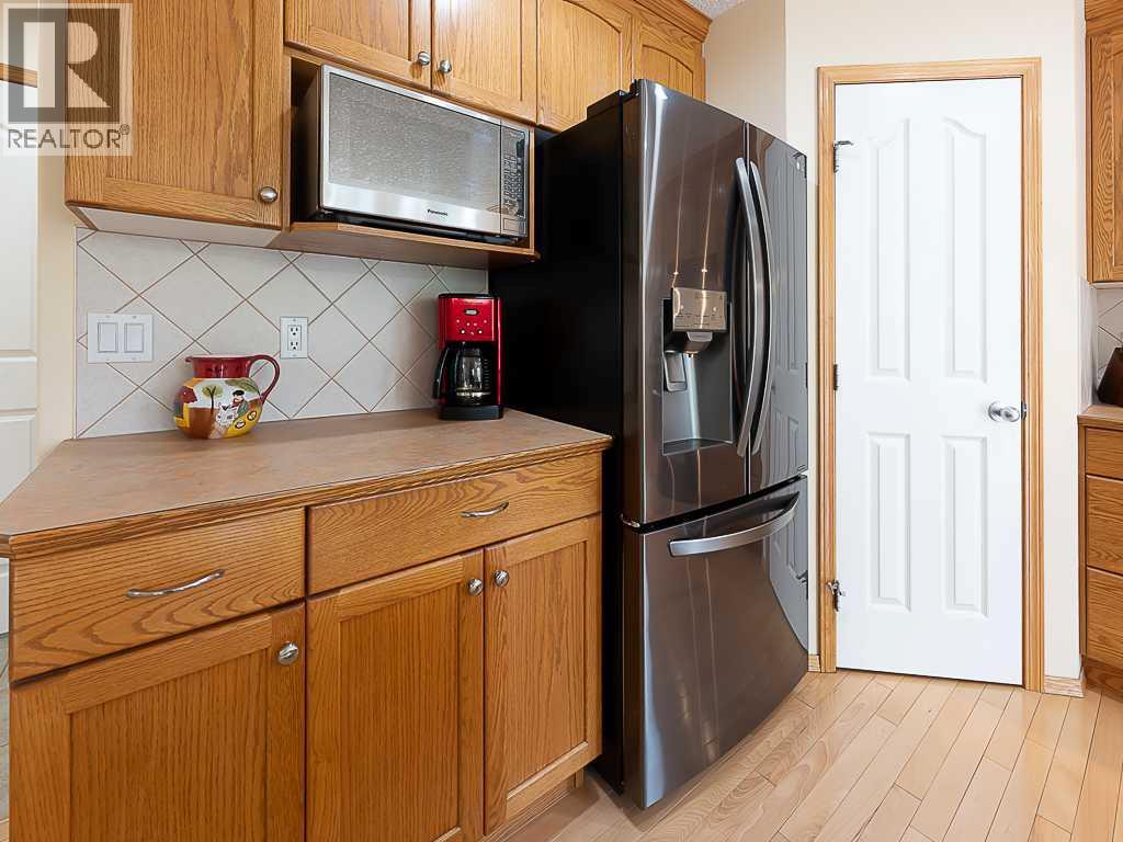 143 Cougarstone Square SW, Calgary, Alberta  T3H 5J4 - Photo 7 - A2318077
