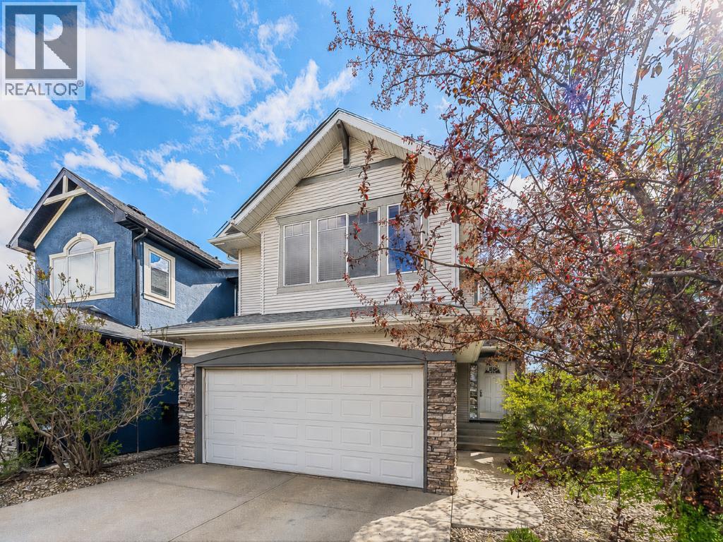 143 Cougarstone Square SW, Calgary, Alberta  T3H 5J4 - Photo 1 - A2318077