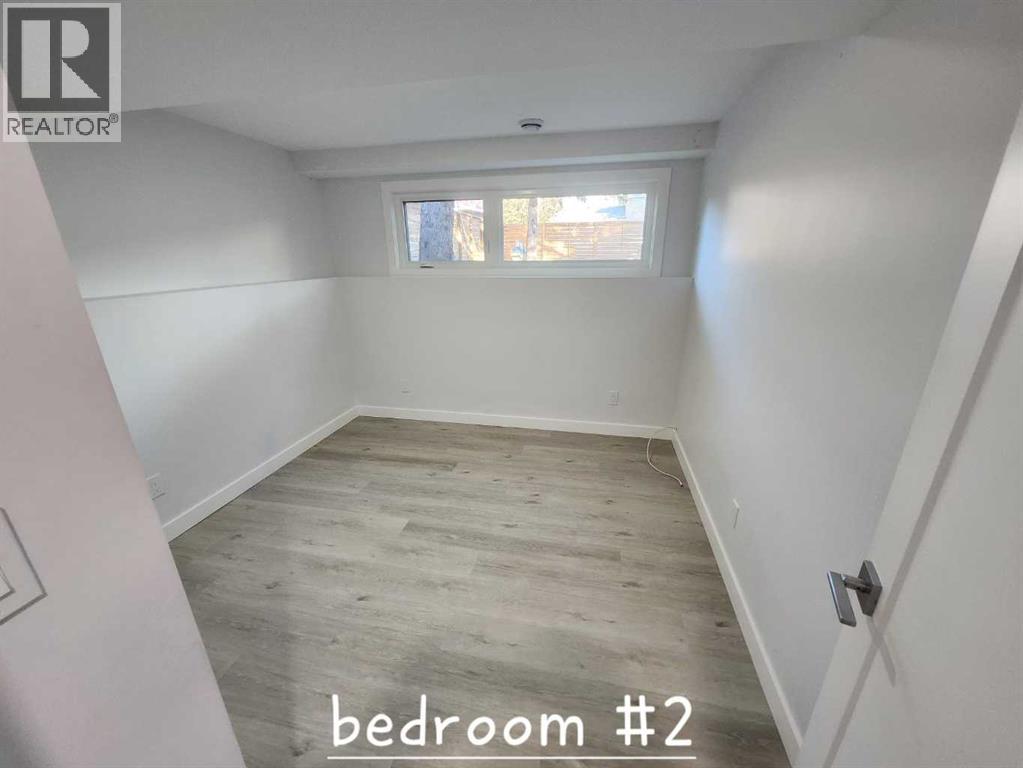 12108 Lake Waterton Way SE, Calgary, Alberta  T2J 2M4 - Photo 33 - A2318605